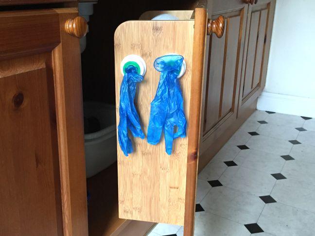 Kitchen paper towels, rubber gloves rack